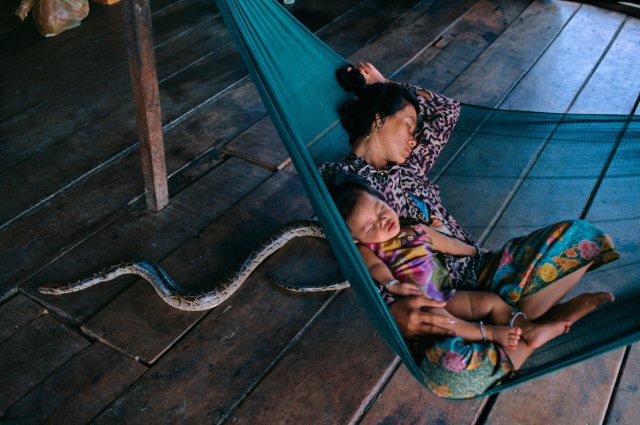 Sleeping with Snake, Tonle Sap, Cambodia, 1996